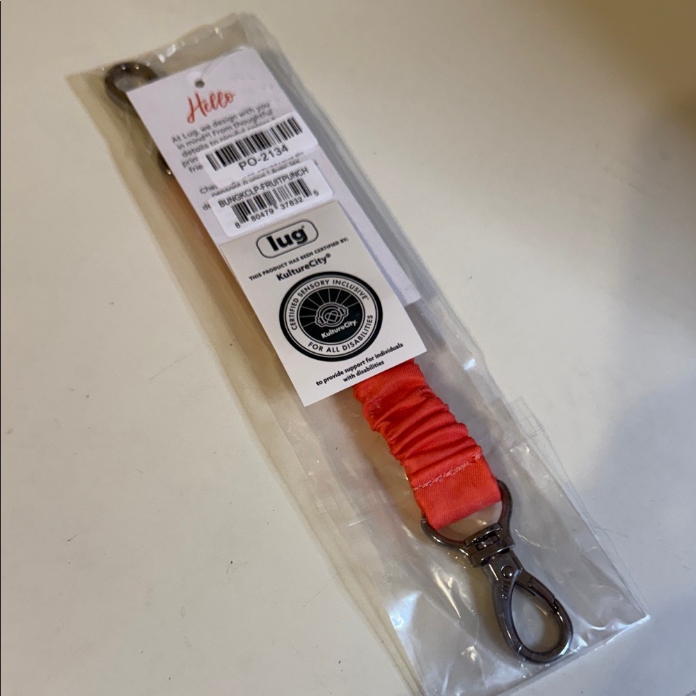 New. Lug. Key bungee. Fruit punch.